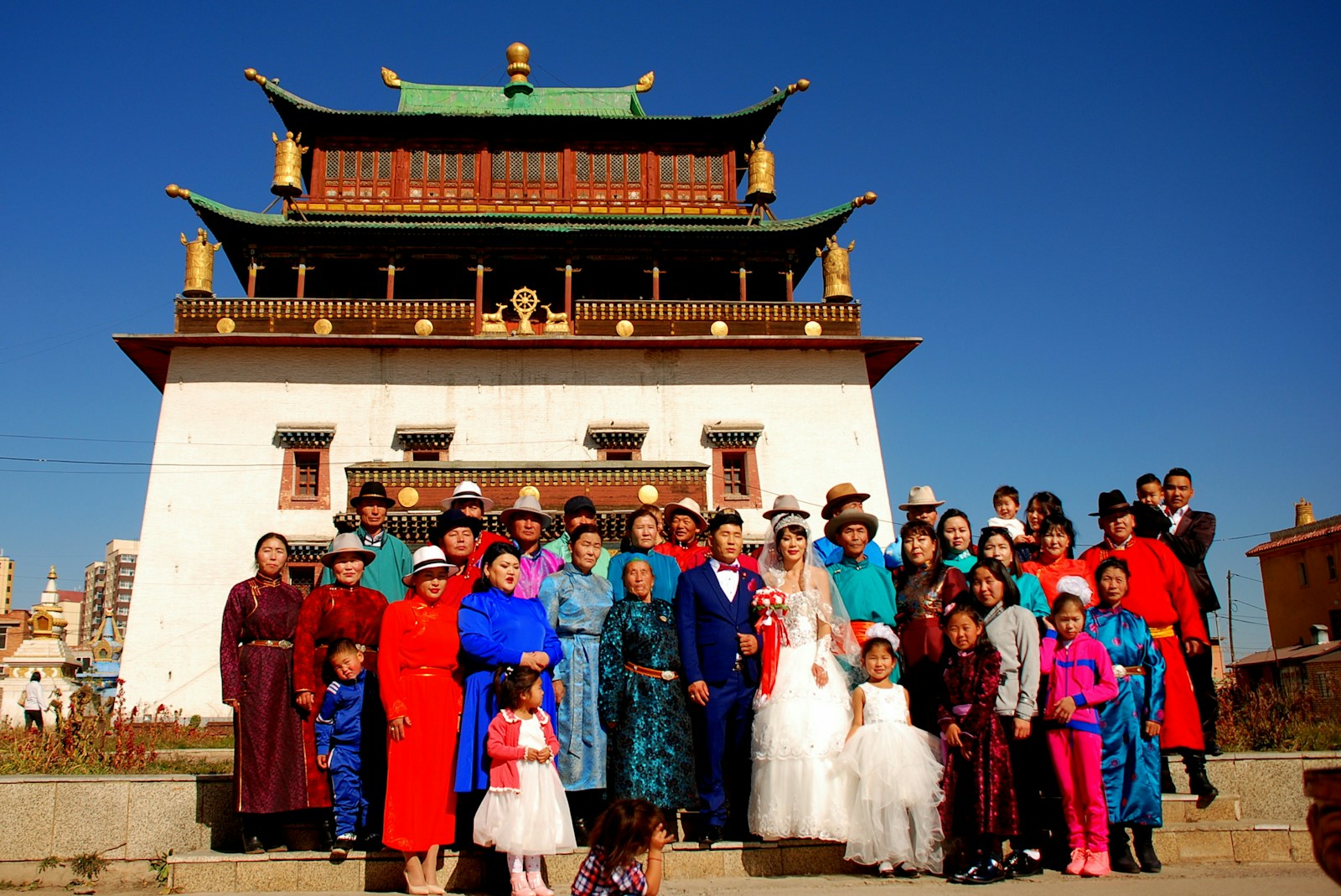 people in front of a pagoda during daytime